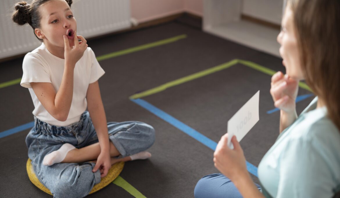 speech therapist teaching a child